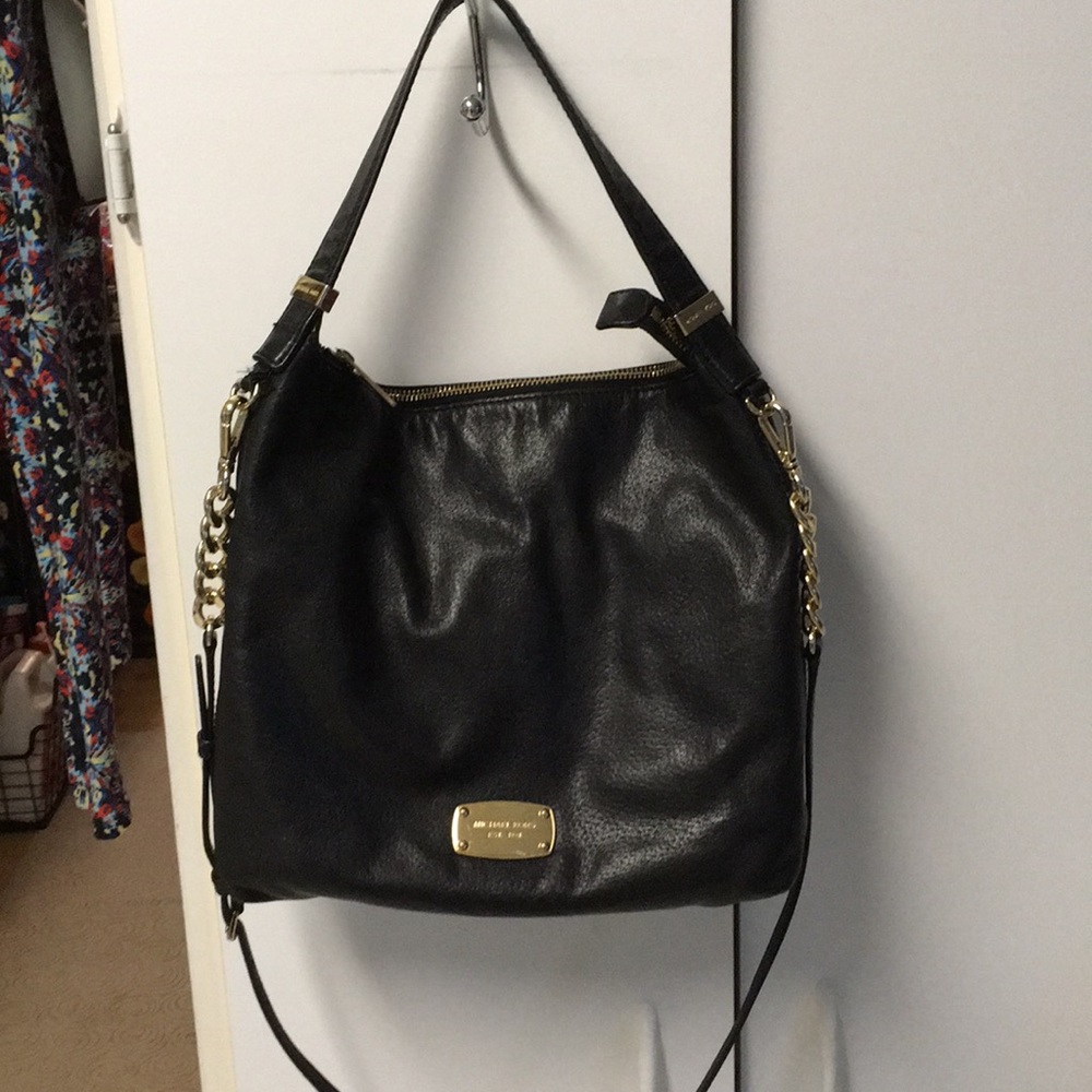 Used Michael Kors Black leather purse.